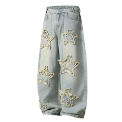 Omirad “Star Distressed Wide-Leg Jeans”