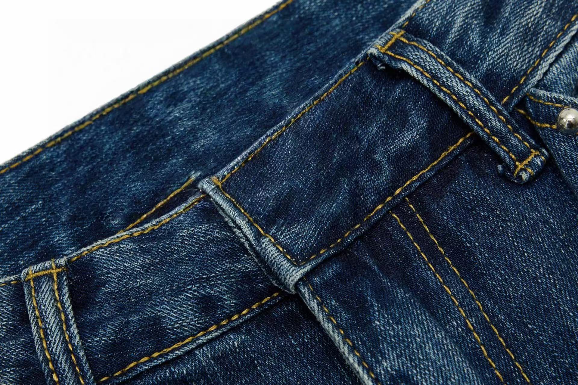 Omirad “Studded Panel Denim Jeans”