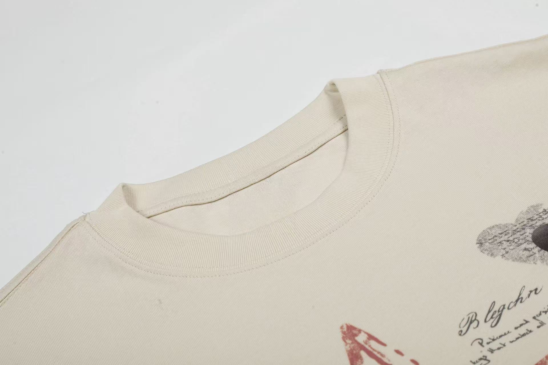 Omirad “Star Script Graphic Tee”