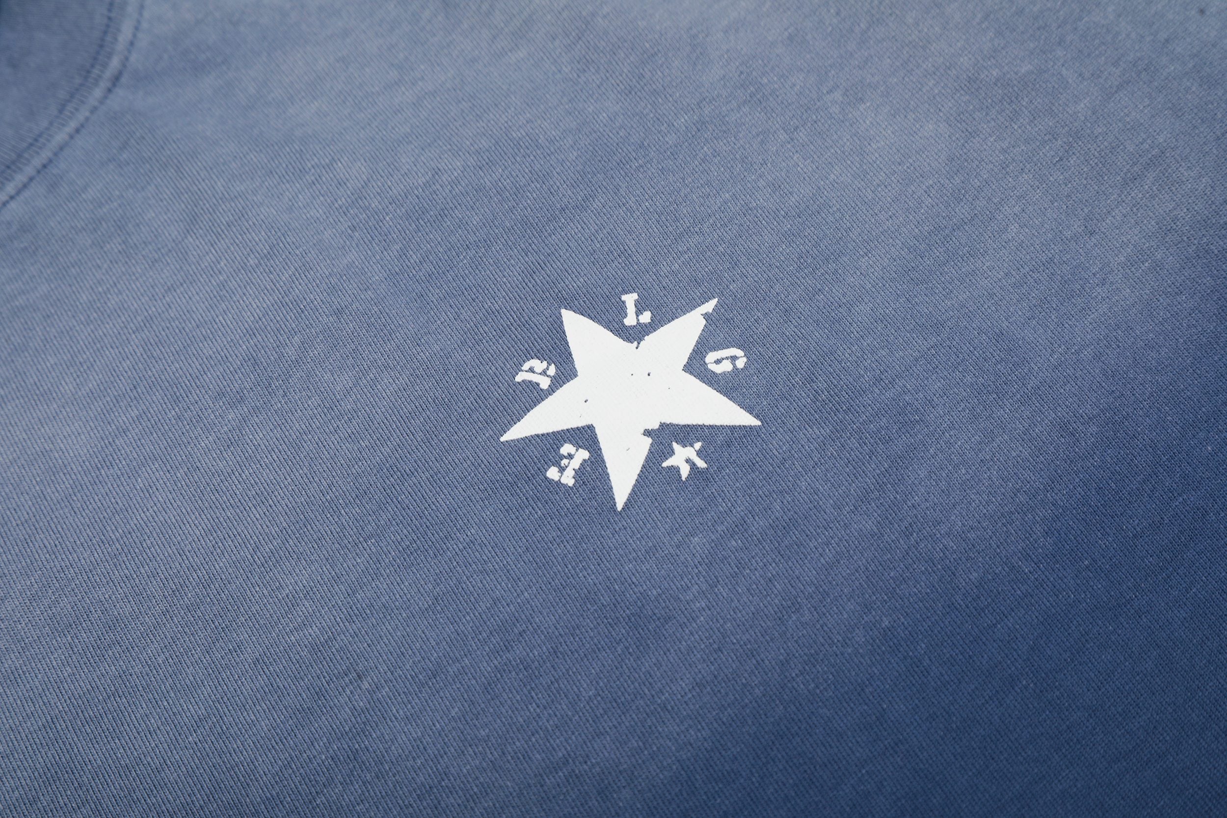 Omirad “Star Fade Back Graphic Tee”