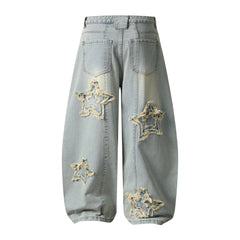 Omirad “Star Distressed Wide-Leg Jeans”