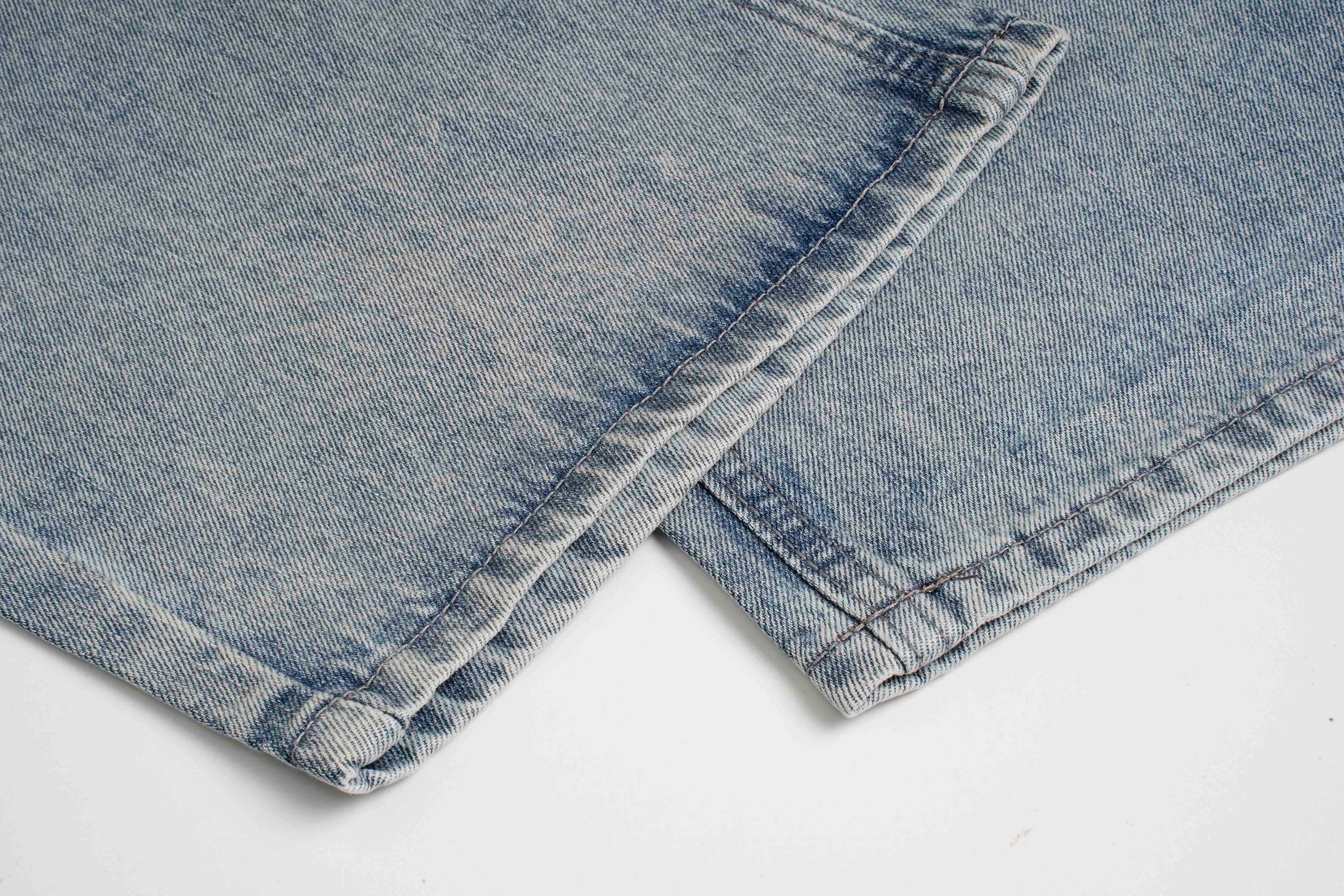Omirad “Stardust Washed Wide-Leg Jeans”
