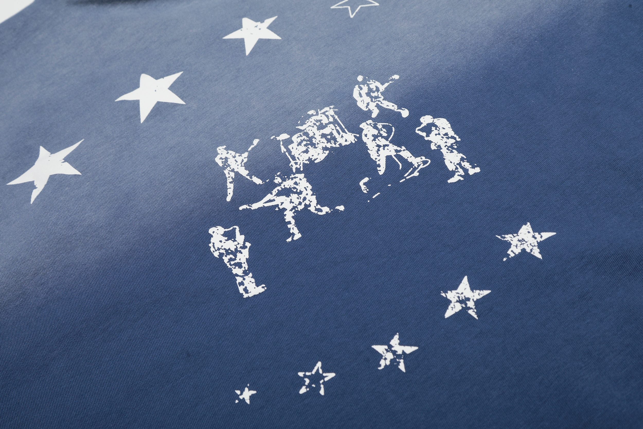 Omirad “Star Fade Back Graphic Tee”