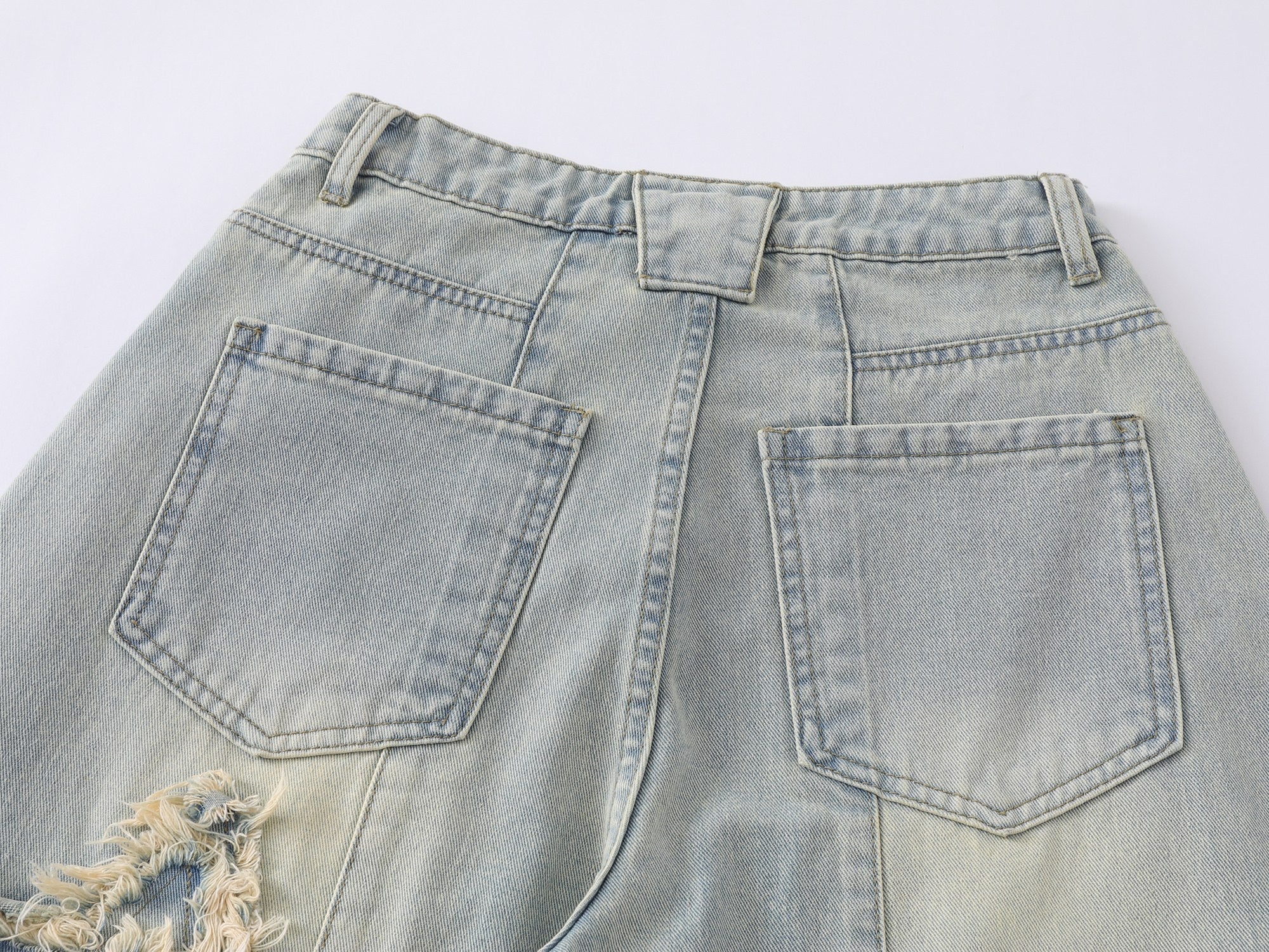 Omirad “Star Distressed Wide-Leg Jeans”