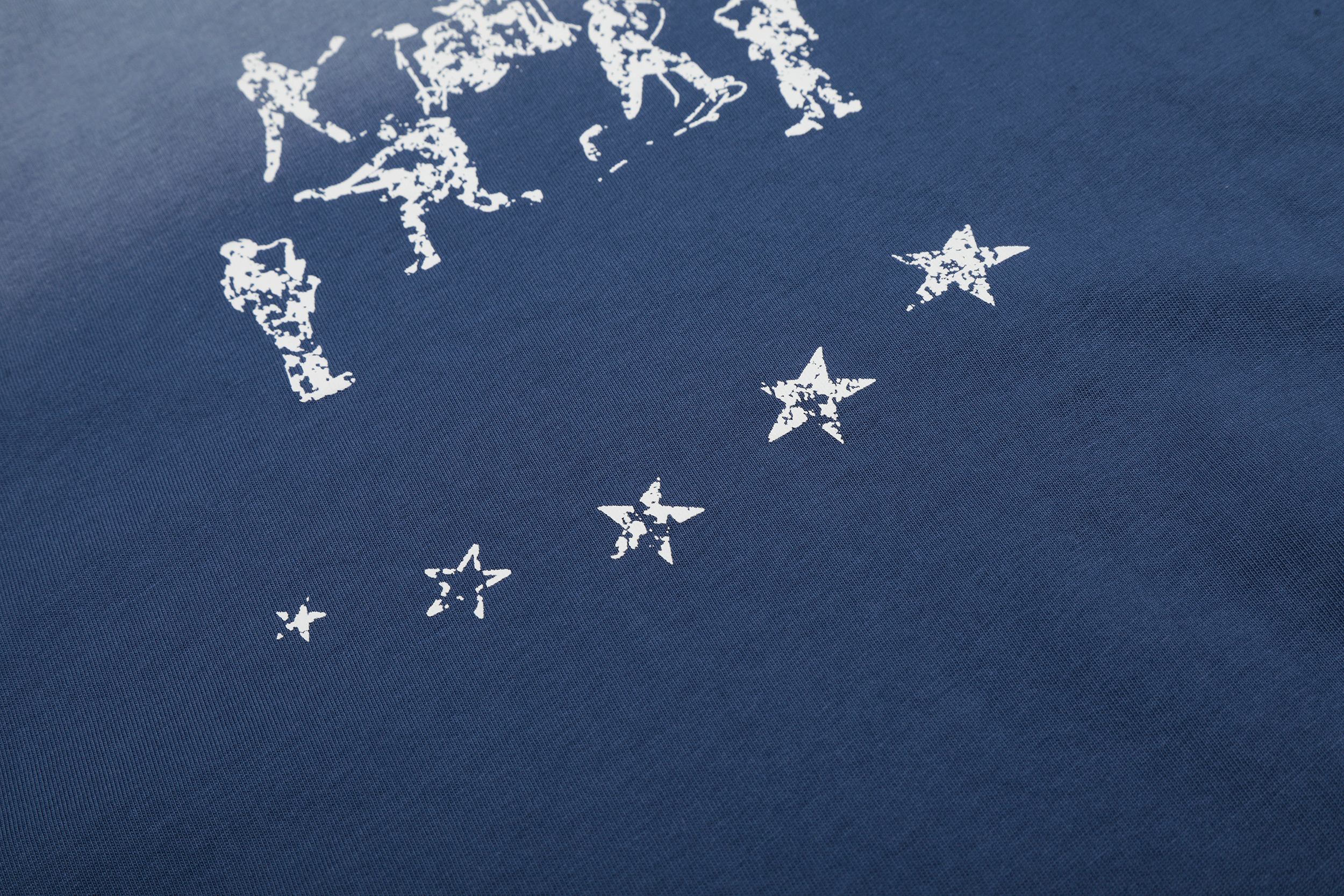 Omirad “Star Fade Back Graphic Tee”