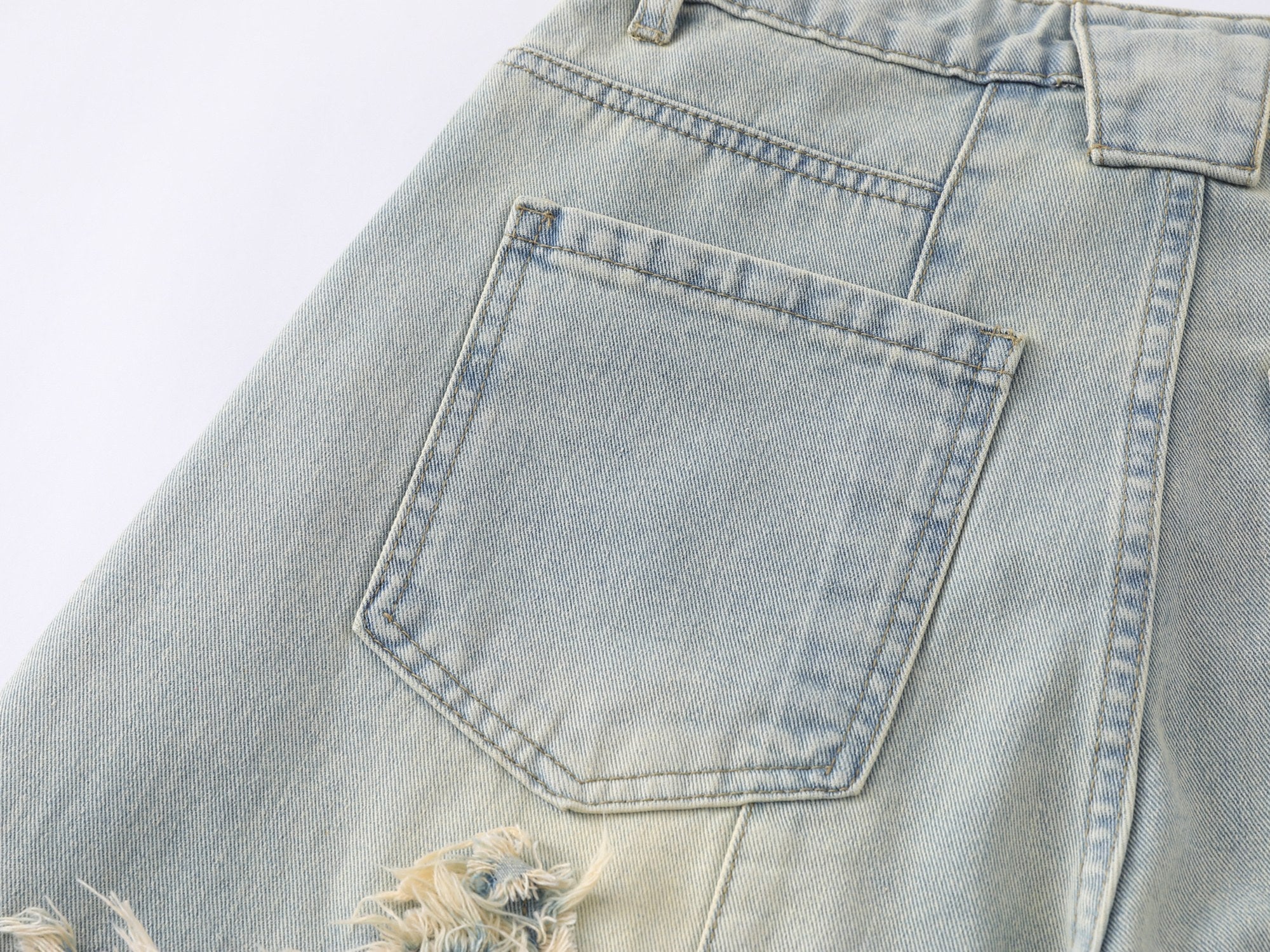 Omirad “Star Distressed Wide-Leg Jeans”