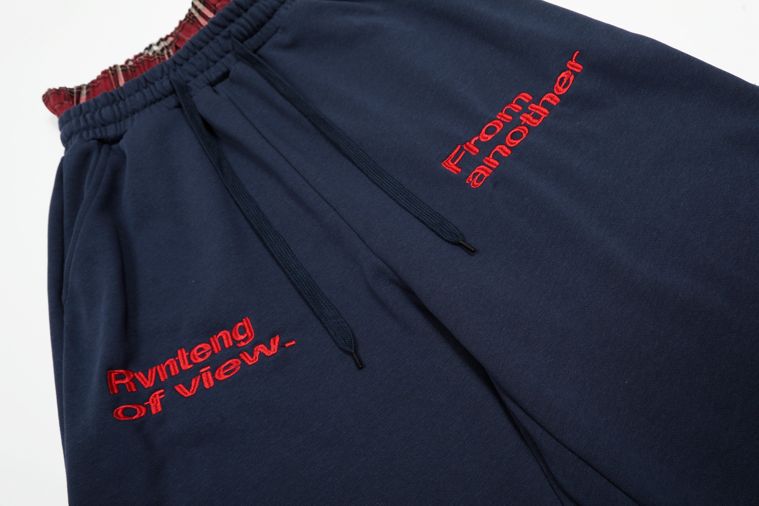 Omirad Plaid-Waist Logo Shorts