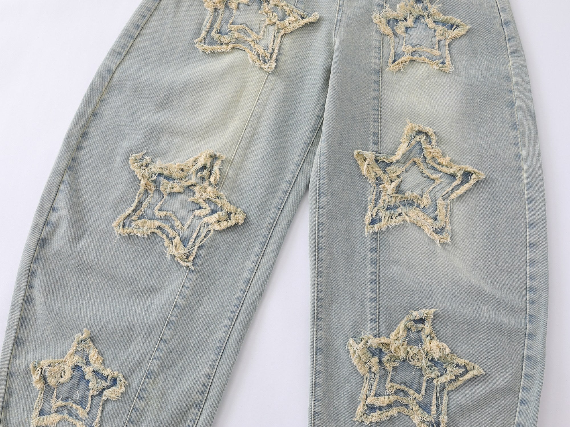 Omirad “Star Distressed Wide-Leg Jeans”