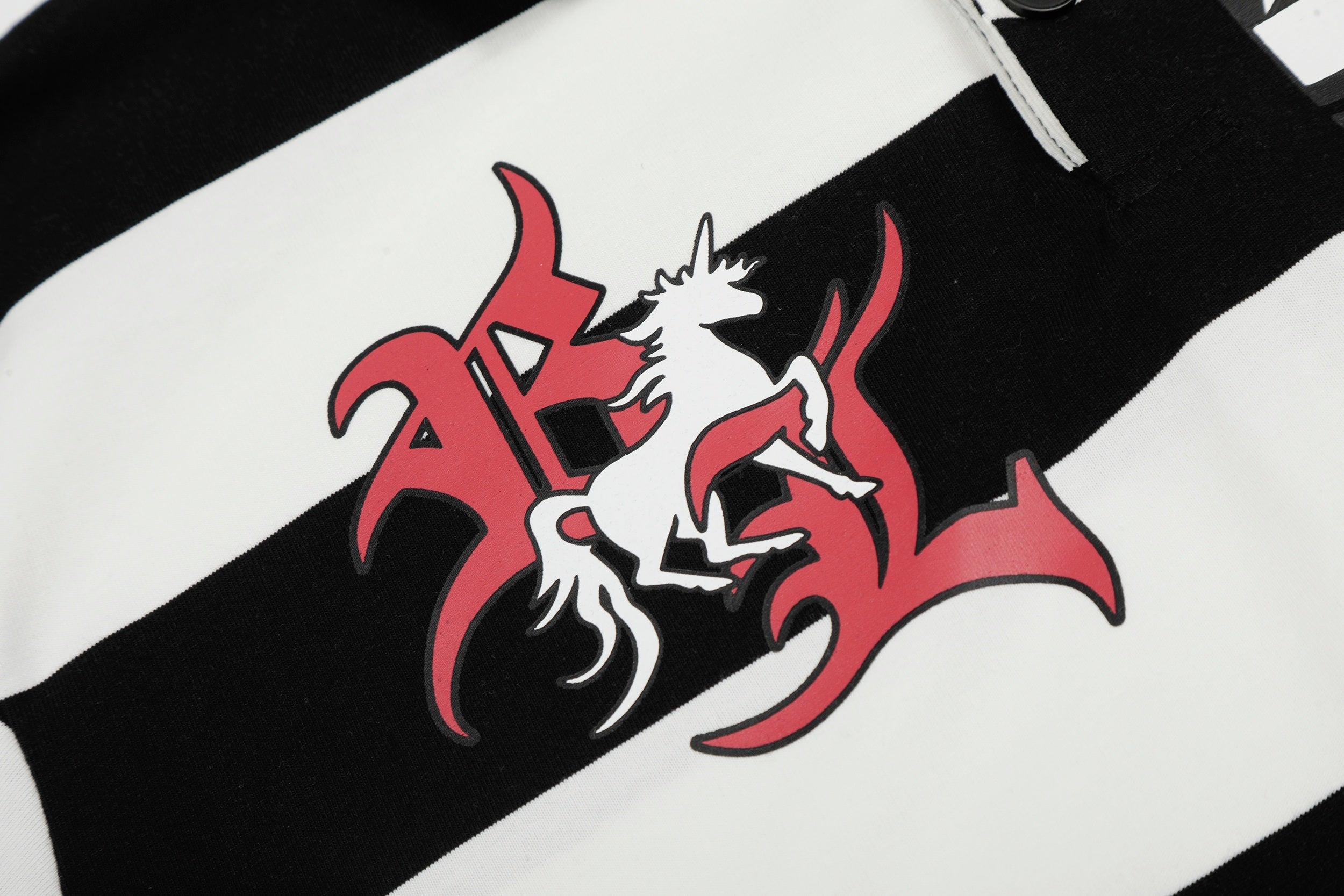 Omirad “Rugby Stripe Graphic Polo”